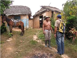 SHI extension agent meeting farmer