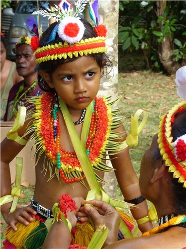 Yapese girl dressing for dance