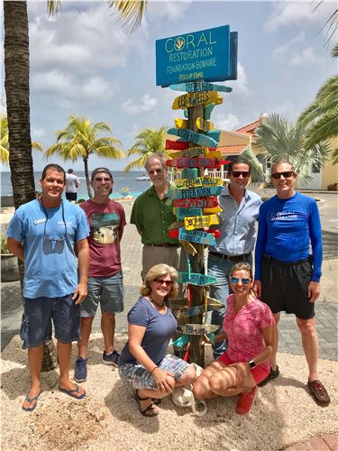 Coral Restoration sign & family visit